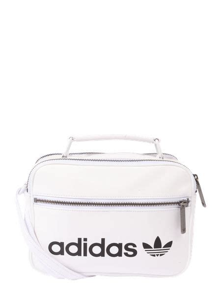 Taschen für Damen von adidas .